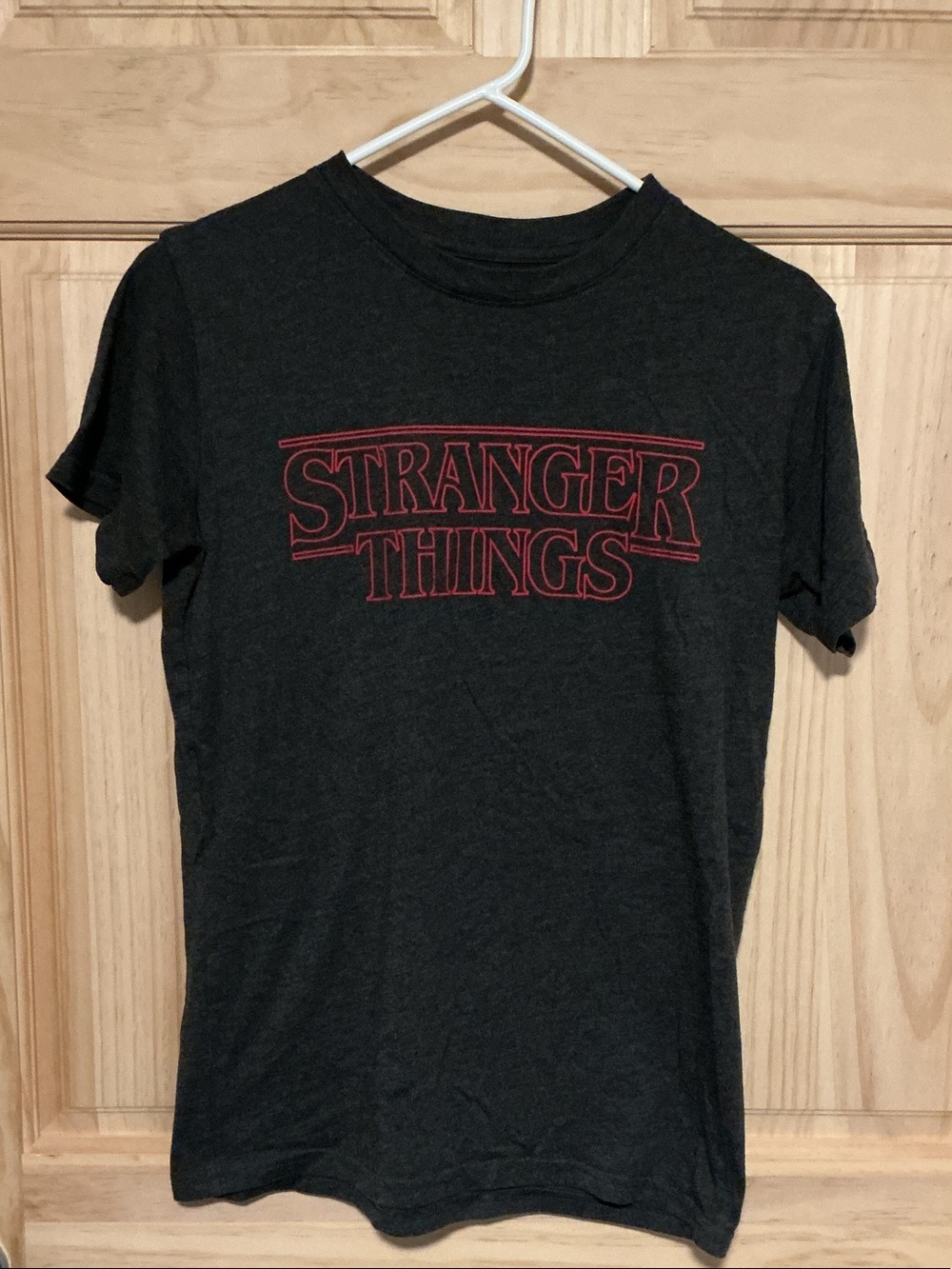 Stranger Things Women's / unisex Short Sleeve Tee - Black with Red Logo - Picture 1 of 3
